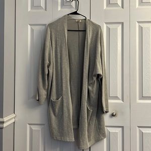 Loose fitting cardigan.